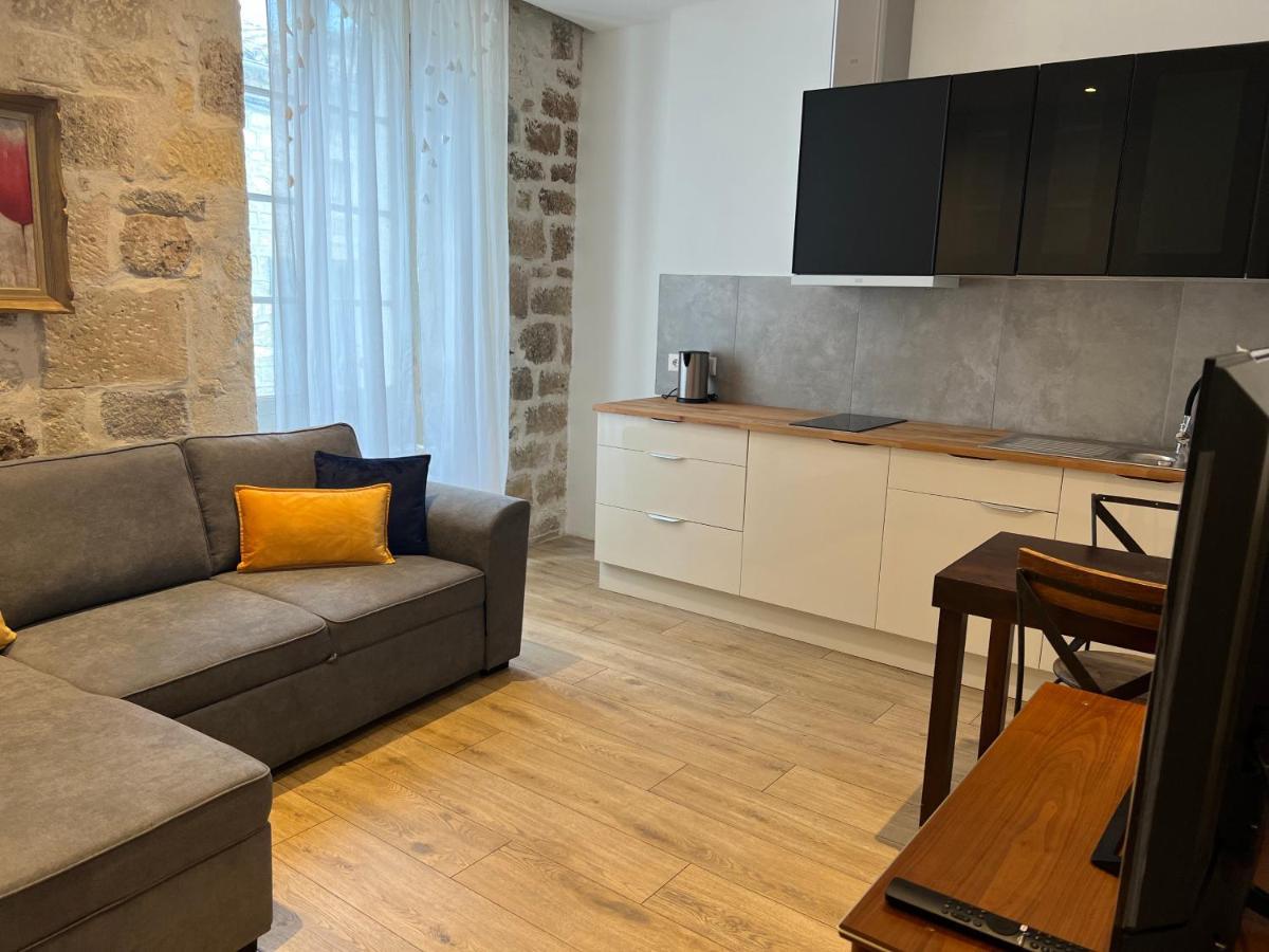 Le Beffroi Aparthotel Tournon-d'Agenais Bagian luar foto